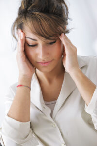 Picture of woman holding her temples