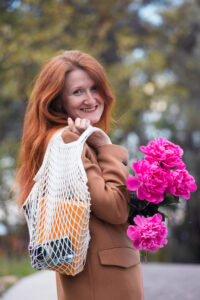 picture of woman looking over her shoulder at the camera and smiling