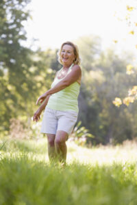 Picture of happy woman outside in nature