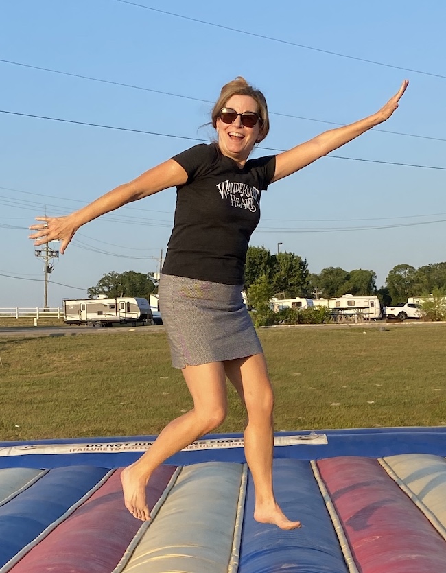 Picture of author Sara jumping on jump pad.