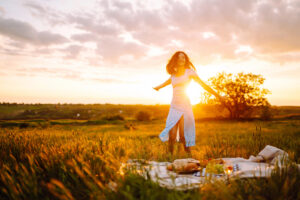 Picture of happy woman in a field