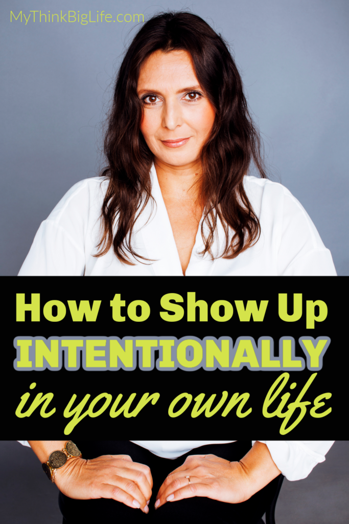 Picture of confident woman looking directly at the camera with the words: How to show up intentionally in your own life