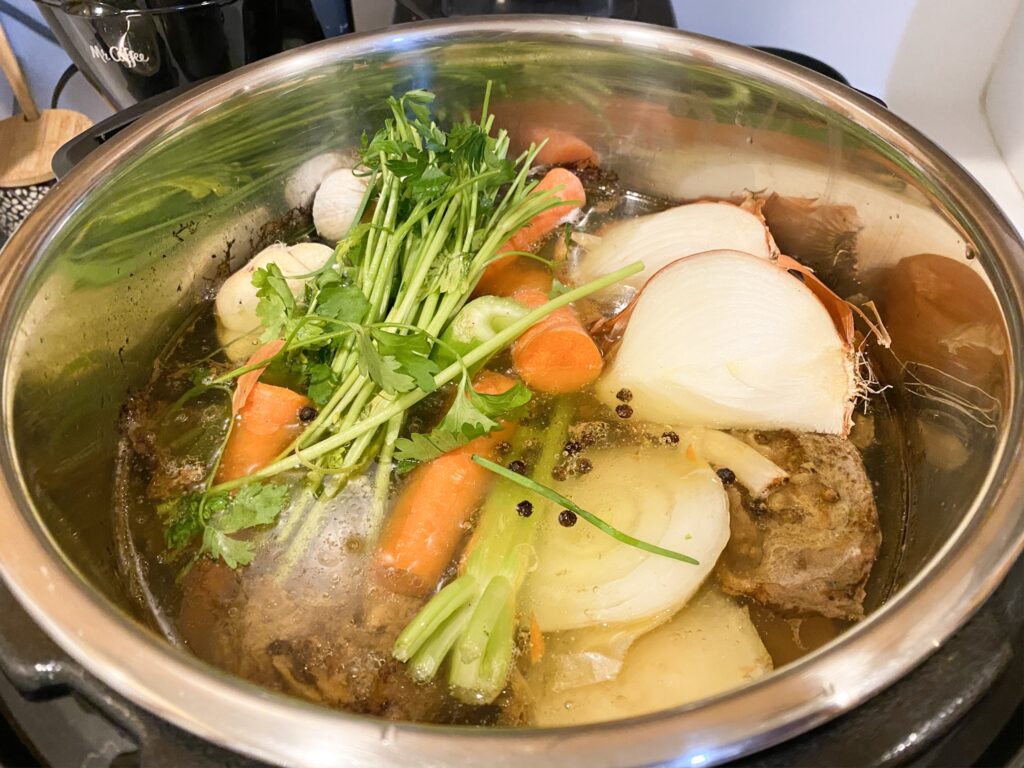 After cooking for two hours, add chopped vegetables to the broth
