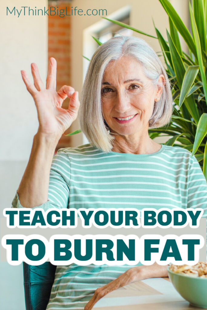 PICTURE of woman making okay sign with her fingers with the words: Teach your body to burn fat